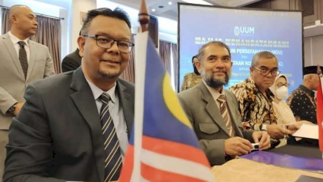 Rektor UUM Prof. Dr. Haim Hilman Abdullah (kiri) dan Ketua Umum APTISI Dr. Ir. H. M Budi Djatmiko, MSi., MEI,. (kanan). Ist