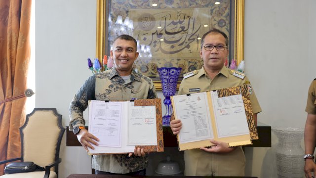 Wali Kota Makassar Moh Ramdhan Pomanto melakukan Penandatanganan Nota Kesepakatan Bersama (MoU) antara Pemkot Makassar dengan PT Bank Mandiri (Persero) tentang Penyediaan Solusi Perbankan untuk Layanan Publik di Kota Makassar, Senin (31/07/2023).