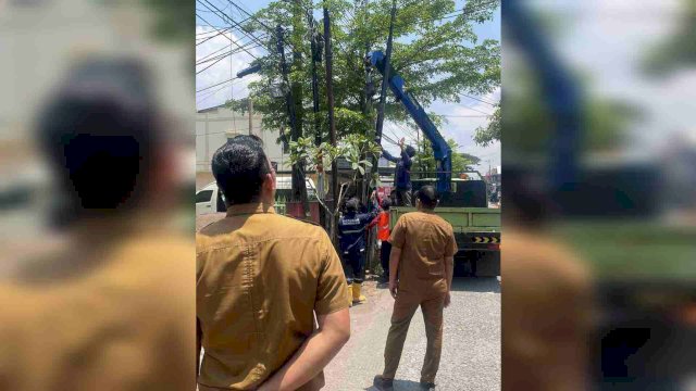 Dinas PU Kota Makassar gelar Ops Penertiban tiang kabel fiber ilegal. Foto:Ist 