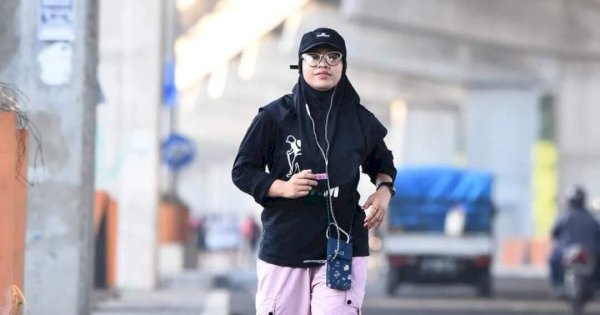 Lari Pagi Makin Seru: Fakra Rauf Bebas Streaming Musik Favorit Berkat Indosat