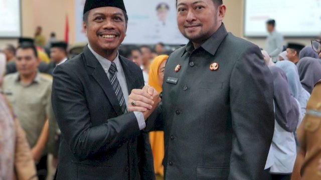 Kepala Badan Pendapatan Daerah (Bapenda) Kota Makassar, Andi Asminullah bersama Firman Hamid Pagarra.