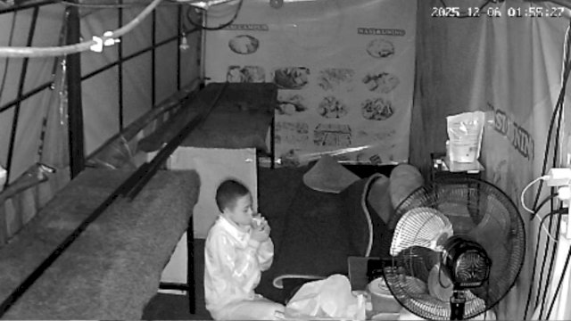 Screenshot CCTV Warung Nasi Kuning "Ilham". Pelaku terlihat masuk kedalam warung. 