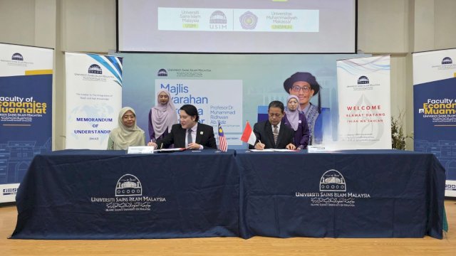 Proses penandatanganan MoU Unismuh dan USIM di kampus Unismuh Makassar. (Dok. Unismuh)